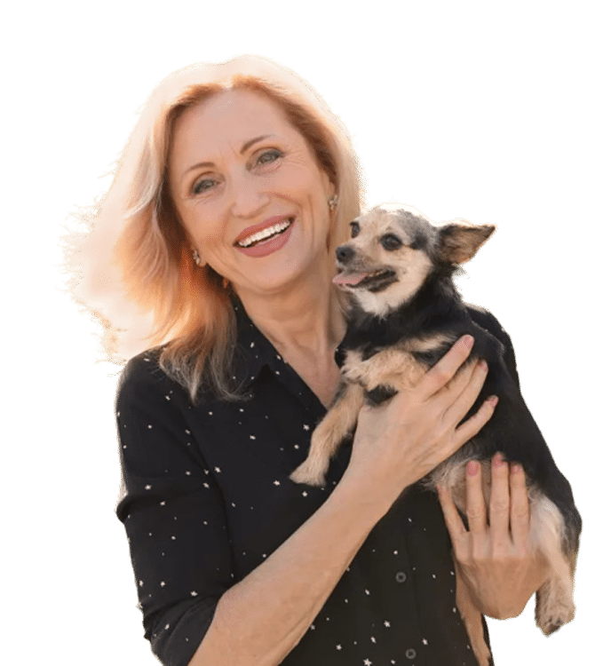 Senior holding a puppy